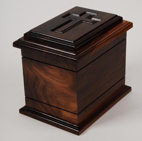 Walnut funeral urn with cross