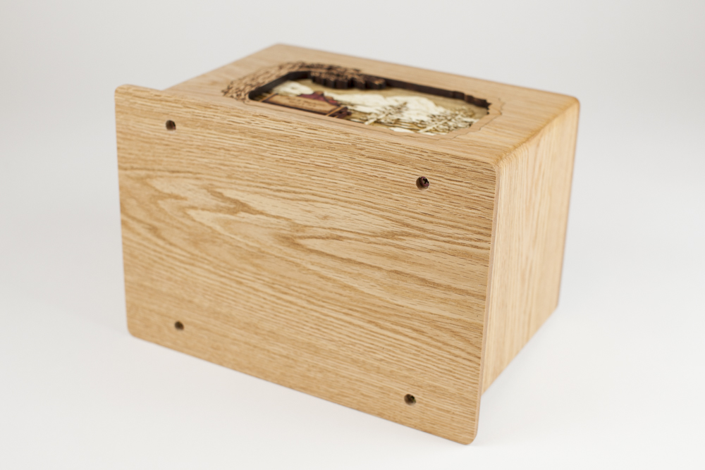 Cremation urn interior is accessed from bottom panel