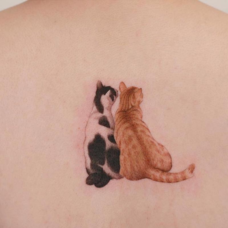 Colorful cat memorial tattoo art
