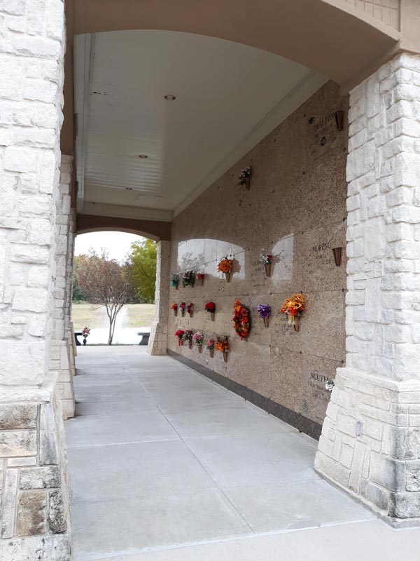 Mausoleum wall decorated with flowers