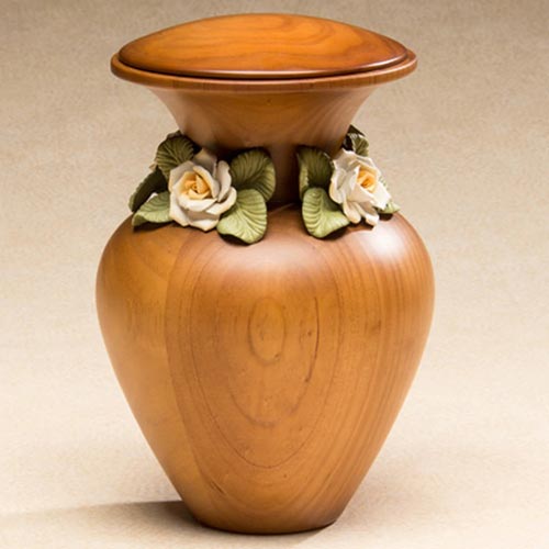 Wood urn with ceramic white roses
