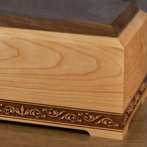 Solid wood cremation urn with sculpture carving