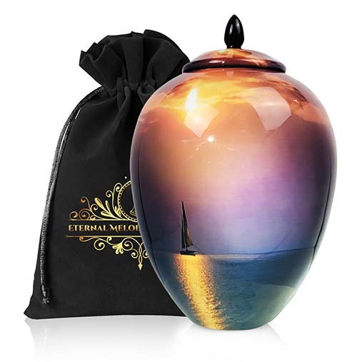 sunset sailboat cremation urns